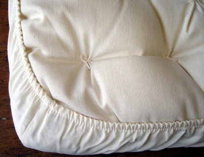 The perfect addition to keep baby sleeping comfy, safe, and sound. Protect your bassinet mattress with our handmade fitted sheet. Organic cotton sateen with cotton elastic sewn in all around the edges for a snug, secure fit. Machine washable and easy to care for. Intended for use with mattresses measuring 18" x 35" x 2.5".