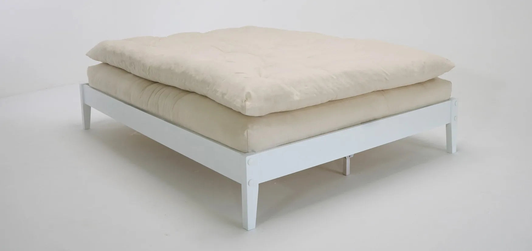 Top any mattress with the luxurious Honest Nest organic wool topper by TFS Honest Sleep!  This organic wool topper is made with layers of organic wool batting and covered in organic cotton fabric.  Approximately 4″ thick. Made with a 7 oz. Organic Cotton Twill cover. Made with no petrochemicals or flame retardants!