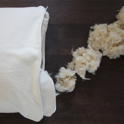 Our softest, and most popular organic pillow.

Organic kapok is in an organic cotton casing.  This vegan pillow offers luxurious softness and “fluffability” without the feathers. It’s the perfect plant-based alternative to down and is considered our most plush (and popular) pillow.