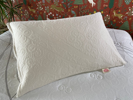 Keep your pillow fresh with the Organic Cotton Knit Pillow Protector by Suite Sleep, made from 100% GOTS-certified organic cotton for soft, breathable comfort.