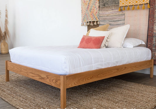 The Pecos bed is all about clean lines and a minimal look. Its price and functionality make it a top seller. Like all Nomad bed frames, the Pecos is made from either Red Oak or Hard Maple—both American-sourced hardwoods. Hidden hardware adds to its durability and sleek appearance. The Pecos stands 14″ tall, with slats positioned 12″ from the floor.