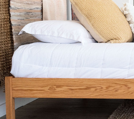 The Pecos bed is all about clean lines and a minimal look. Its price and functionality make it a top seller. Like all Nomad bed frames, the Pecos is made from either Red Oak or Hard Maple—both American-sourced hardwoods. Hidden hardware adds to its durability and sleek appearance. The Pecos stands 14″ tall, with slats positioned 12″ from the floor.