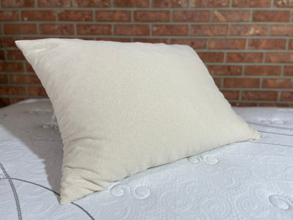 Our shredded latex pillow is a versatile, comfortable option for side sleepers and back sleepers alike. The shredded latex fill conforms to your head and neck, providing excellent support and pressure relief. The organic cotton jersey knit cover is soft and breathable, and it helps to wick away moisture to keep you cool and comfortable all night long.