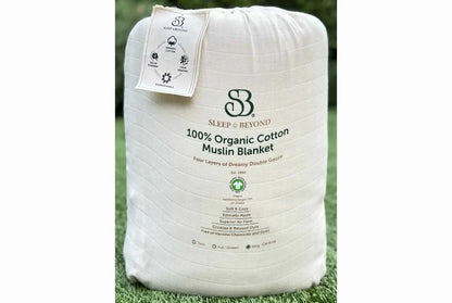 Indulge in the ultimate comfort with our organic blanket, crafted from four layers of luxurious double gauze GOTS-certified organic cotton muslin. Uniquely designed for breathability and softness, it’s free of harmful chemicals and dyes, ensuring a soothing and safe sleep environment. With a relaxed, crinkled style, this blanket offers exceptional airflow and becomes even softer and cozier with each wash. Choose from four delightful color options to suit your style and enhance your bedding ensemble.