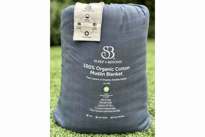 Indulge in the ultimate comfort with our organic blanket, crafted from four layers of luxurious double gauze GOTS-certified organic cotton muslin. Uniquely designed for breathability and softness, it’s free of harmful chemicals and dyes, ensuring a soothing and safe sleep environment. With a relaxed, crinkled style, this blanket offers exceptional airflow and becomes even softer and cozier with each wash. Choose from four delightful color options to suit your style and enhance your bedding ensemble.