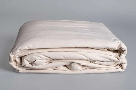 This Organic Cotton mattress encasement by Sleep and Beyond is an innovative 100% organic cotton two layer jersey that offers a zippered waterproof solution.  This encasement can prolong the life of your bed and protect it from stains, leaks, dust mites and bed bugs all in one!  It is fully reversible with a six sided design that offers full mattress protection.  Free of vinyl/PVC, phthalates and other harmful chemicals, it is crafted with two layers of soft 100% organic cotton jersey fabric with non-toxic 