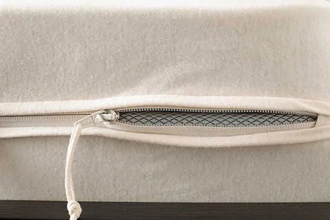 This Organic Cotton mattress encasement by Sleep and Beyond is an innovative 100% organic cotton two layer jersey that offers a zippered waterproof solution.  This encasement can prolong the life of your bed and protect it from stains, leaks, dust mites and bed bugs all in one!  It is fully reversible with a six sided design that offers full mattress protection.  Free of vinyl/PVC, phthalates and other harmful chemicals, it is crafted with two layers of soft 100% organic cotton jersey fabric with non-toxic 
