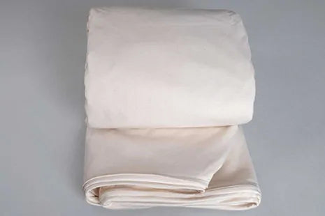 This Organic Cotton mattress encasement by Sleep and Beyond is an innovative 100% organic cotton two layer jersey that offers a zippered waterproof solution.  This encasement can prolong the life of your bed and protect it from stains, leaks, dust mites and bed bugs all in one!  It is fully reversible with a six sided design that offers full mattress protection.  Free of vinyl/PVC, phthalates and other harmful chemicals, it is crafted with two layers of soft 100% organic cotton jersey fabric with non-toxic 