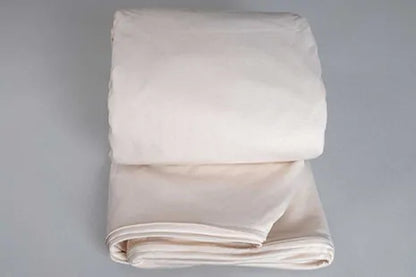 This Organic Cotton mattress encasement by Sleep and Beyond is an innovative 100% organic cotton two layer jersey that offers a zippered waterproof solution.  This encasement can prolong the life of your bed and protect it from stains, leaks, dust mites and bed bugs all in one!  It is fully reversible with a six sided design that offers full mattress protection.  Free of vinyl/PVC, phthalates and other harmful chemicals, it is crafted with two layers of soft 100% organic cotton jersey fabric with non-toxic 