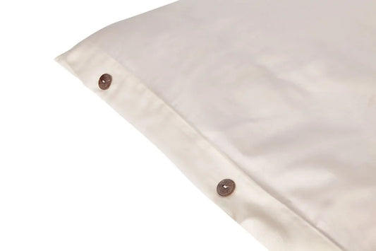 Discover the refreshing comfort of our duvet covers and matching shams, crafted from 300 thread count organic cotton percale. Designed for softness, lightness, and cool breathability, these bedding essentials promise ultimate relaxation. Made from the finest organic cotton, they are completely free of pesticides, harmful dyes, and chemicals, ensuring a clean and healthy sleep environment. Choose from natural ivory or crisp white to perfectly complement your bedroom decor. Each duvet cover set includes match