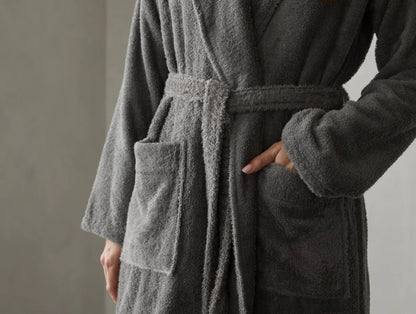 Inspired by our best-selling organic cotton Cloud Loom towels, this robe begins with the same long-staple cotton, loomed into single loops that feel thick and plush, yet lofty. The Aerospin process aligns the fibers in each yarn, making the robe just as soft and absorbent as our towels but a touch smoother and sleeker. The classic shawl-collared silhouette wraps cozily and features an adjustable belt and side pockets.