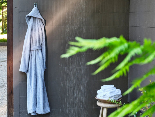 Inspired by our best-selling organic cotton Cloud Loom towels, this robe begins with the same long-staple cotton, loomed into single loops that feel thick and plush, yet lofty. The Aerospin process aligns the fibers in each yarn, making the robe just as soft and absorbent as our towels but a touch smoother and sleeker. The classic shawl-collared silhouette wraps cozily and features an adjustable belt and side pockets.
