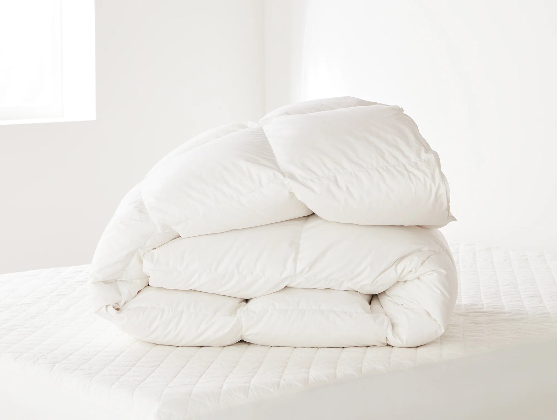 The warmest of our down duvet inserts, the Winter Weight is soft and lofty—will keep you toasty even on the coldest nights. This comfy layer is made with pure down encased in a down-proof, 100% organic cotton shell. Stitch-through box construction keeps the fill evenly distributed, so you stay perfectly warm right down to your toes. It’s filled with the same 600-fill-power down as our Three Season duvet, but with added fill to keep you in comfort. The extra filling also means it feels heavier, which helps s